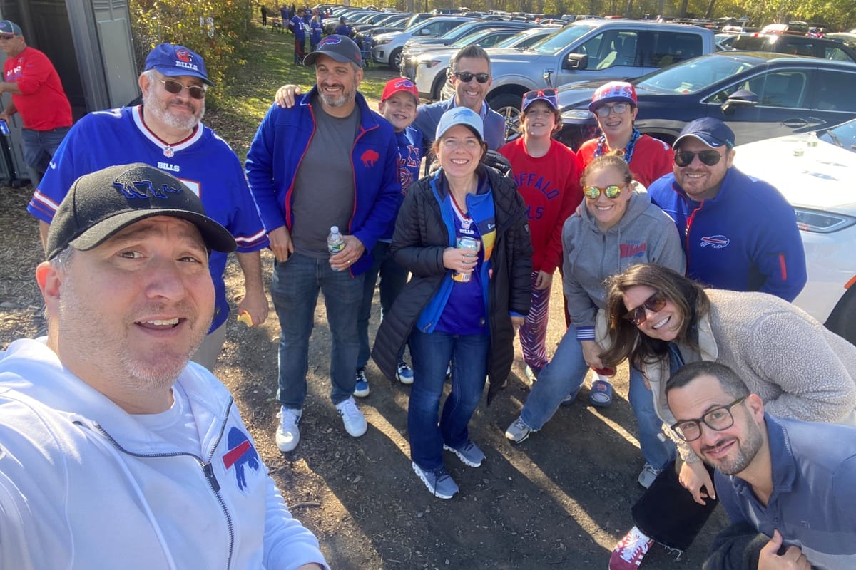 The Be Like John Boyd crew in Bills gear at the stadium tailgate